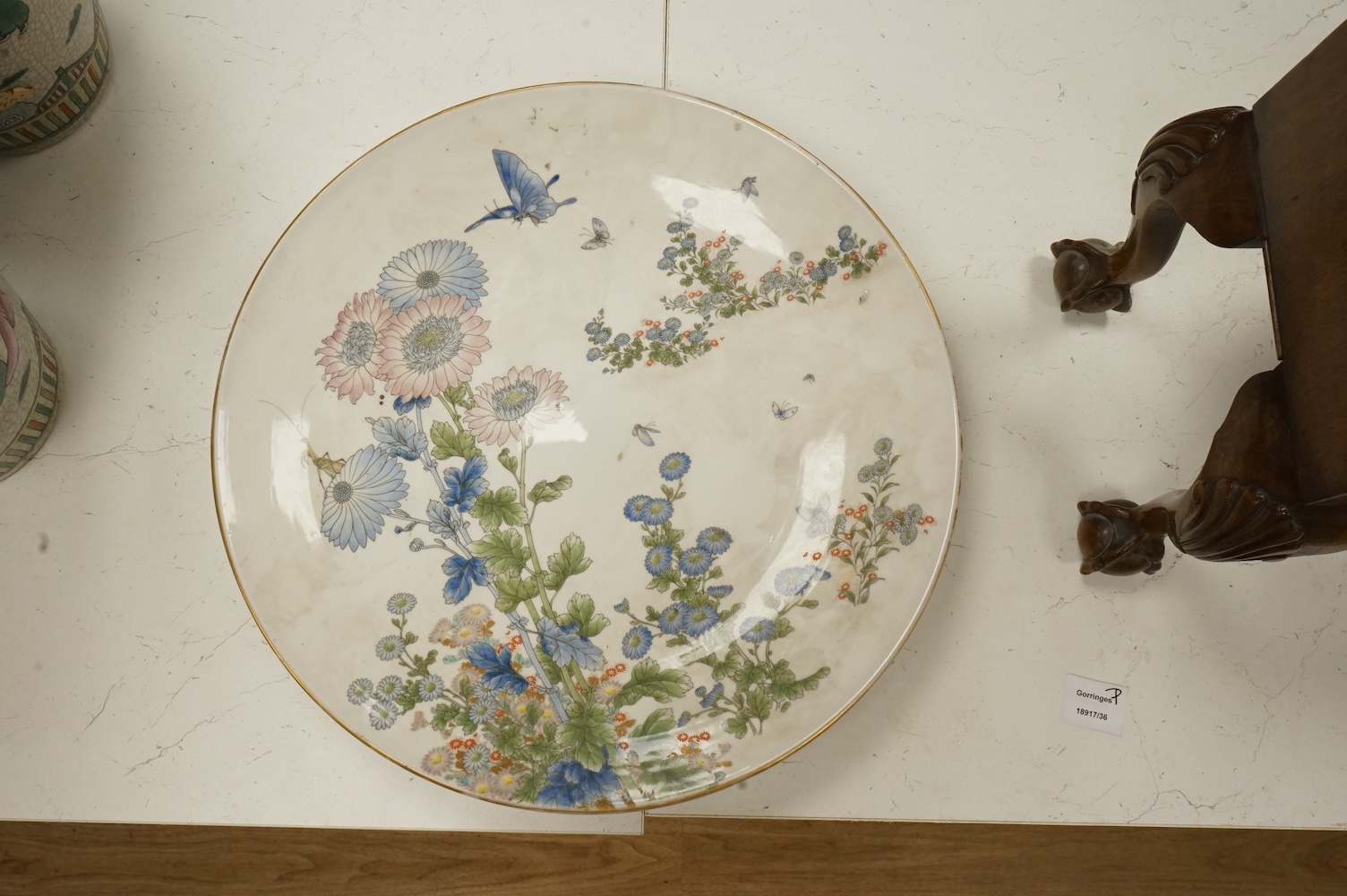 A large Japanese polychrome porcelain dish, by Fukagawa, 45cm diameter
